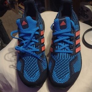 This item is a pair of Adidas Ultraboost 5.0 DNA shoes in the 'Legend Ink